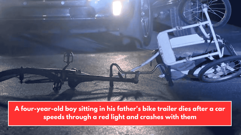 A four-year-old boy sitting in his father's bike trailer dies after a car speeds through a red light and crashes with them