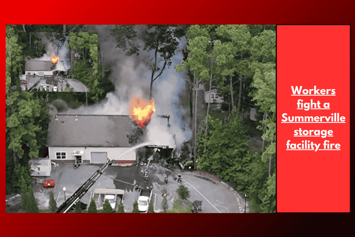 Workers fight a Summerville storage facility fire