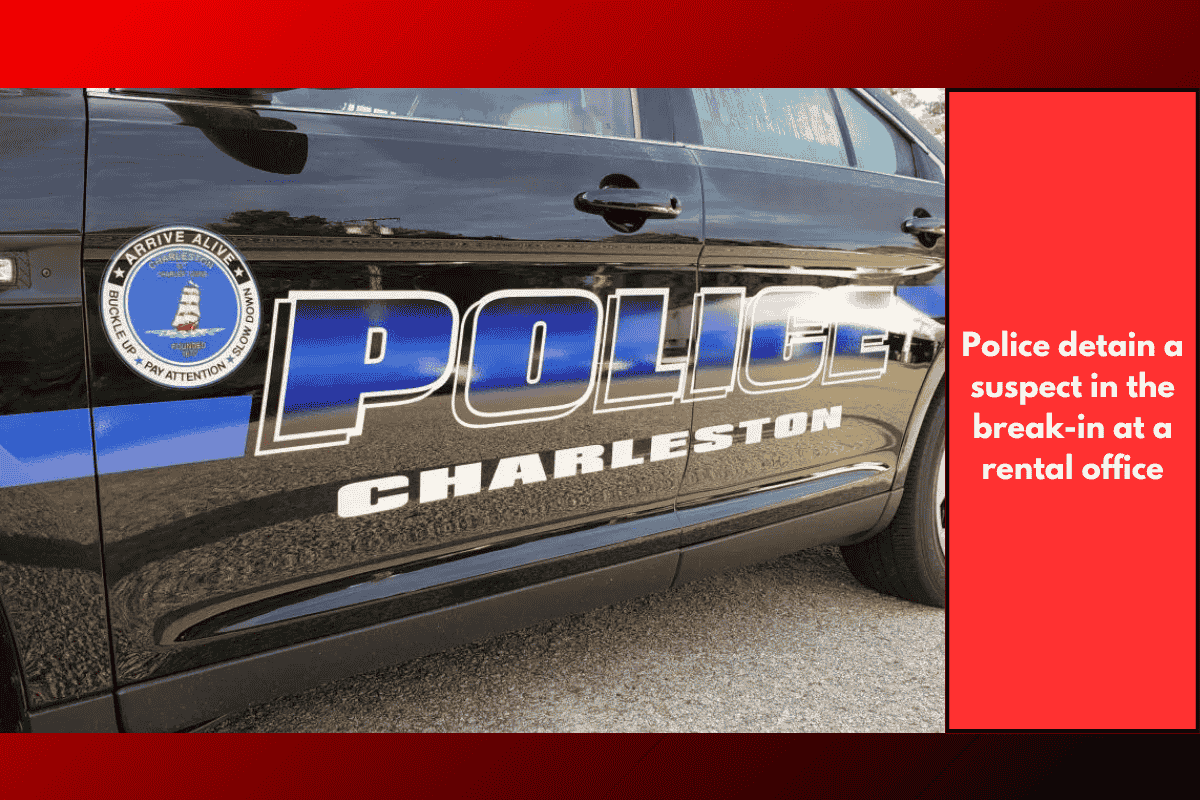 Police detain a suspect in the break-in at a rental office