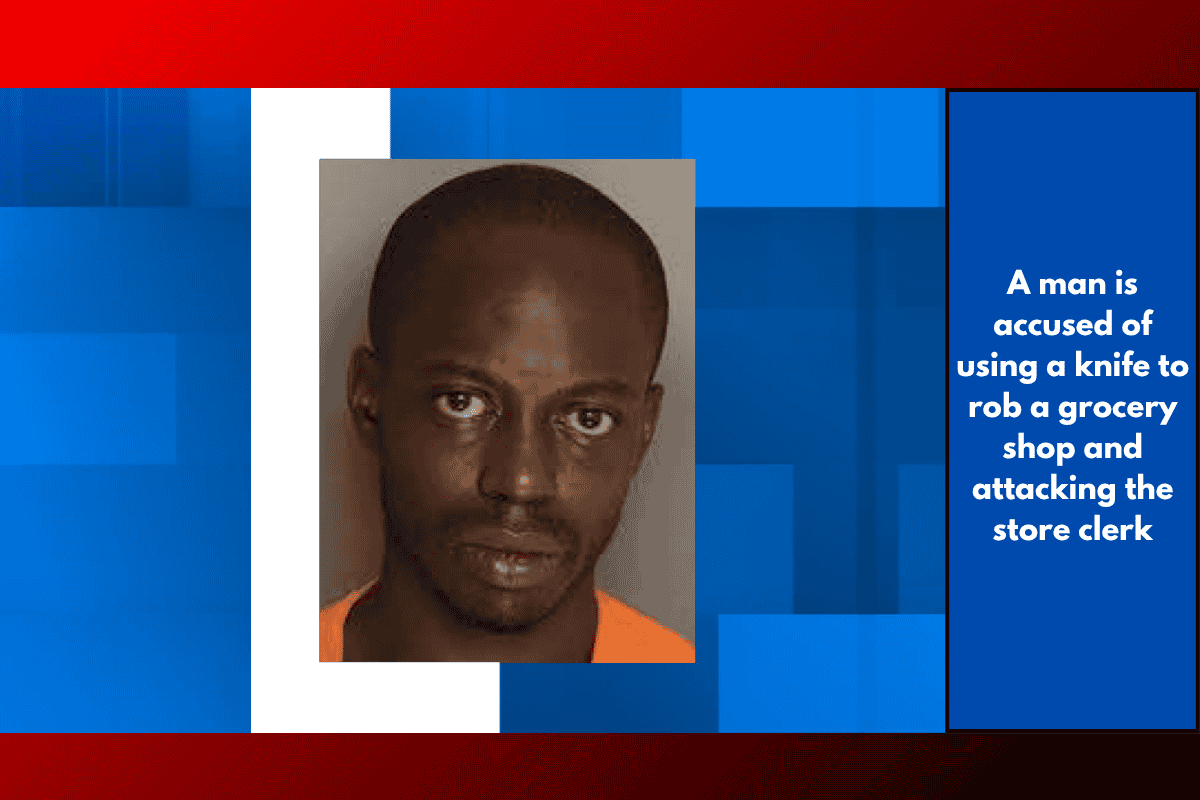 A man is accused of using a knife to rob a grocery shop and attacking the store clerk