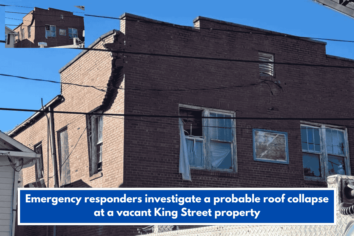 Emergency responders investigate a probable roof collapse at a vacant King Street property