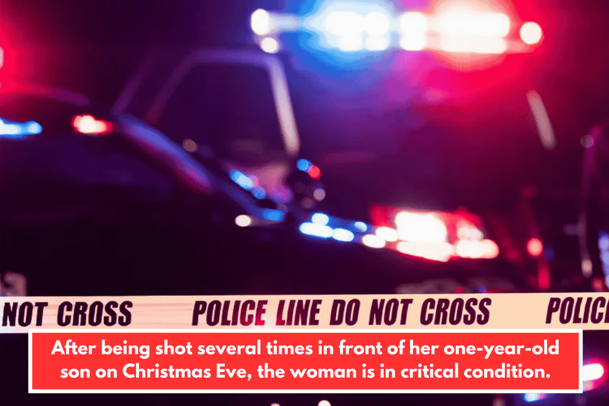 After being shot several times in front of her one-year-old son on Christmas Eve, the woman is in critical condition.