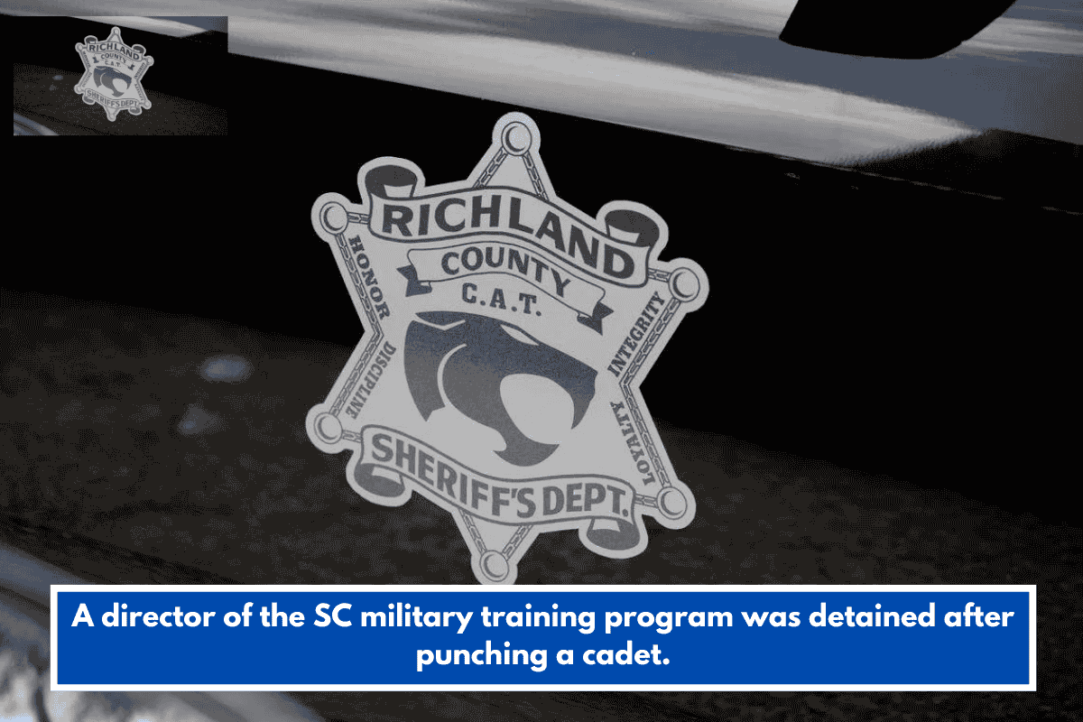 A director of the SC military training program was detained after punching a cadet.
