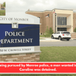 After being pursued by Monroe police, a man wanted in South Carolina was detained.