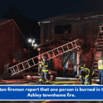 Charleston firemen report that one person is burned in the West Ashley townhome fire.