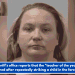 The sheriff's office reports that the "teacher of the year" was detained after repeatedly striking a child in the forehead.