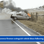 West Florence firemen extinguish vehicle blaze following wreck.