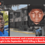 A man has been detained, and a second suspect is being sought in the September 2025 killing in Beaufort.