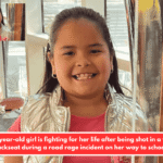 A 10-year-old girl is fighting for her life after being shot in a van's backseat during a road rage incident on her way to school.