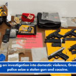 During an investigation into domestic violence, Greenville police seize a stolen gun and cocaine.
