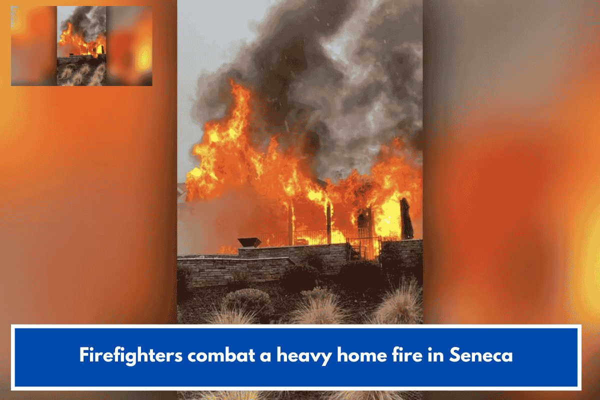 Firefighters combat a heavy home fire in Seneca