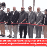 Charleston officials celebrate the completion of the Low Battery seawall project with a ribbon cutting ceremony.