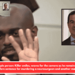 I'm a people person: Killer smiles, waves for the camera as he remains defiant before sentence for murdering a neurosurgeon and another man.