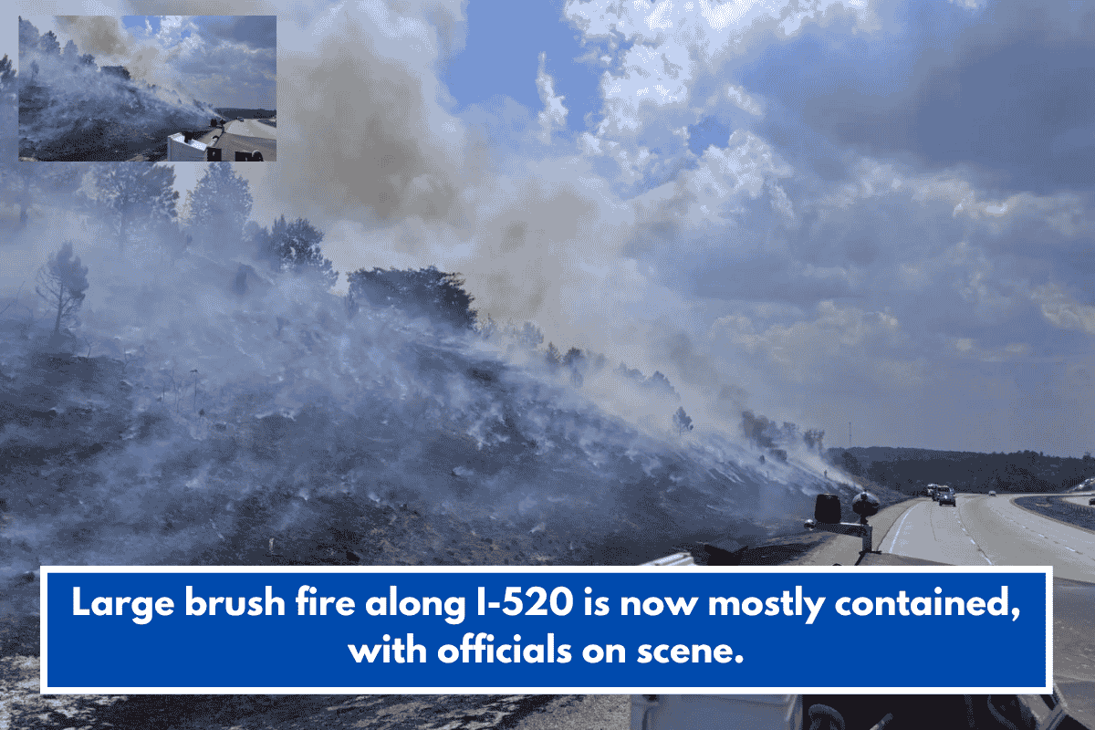 Large brush fire along I-520 is now mostly contained, with officials on scene.